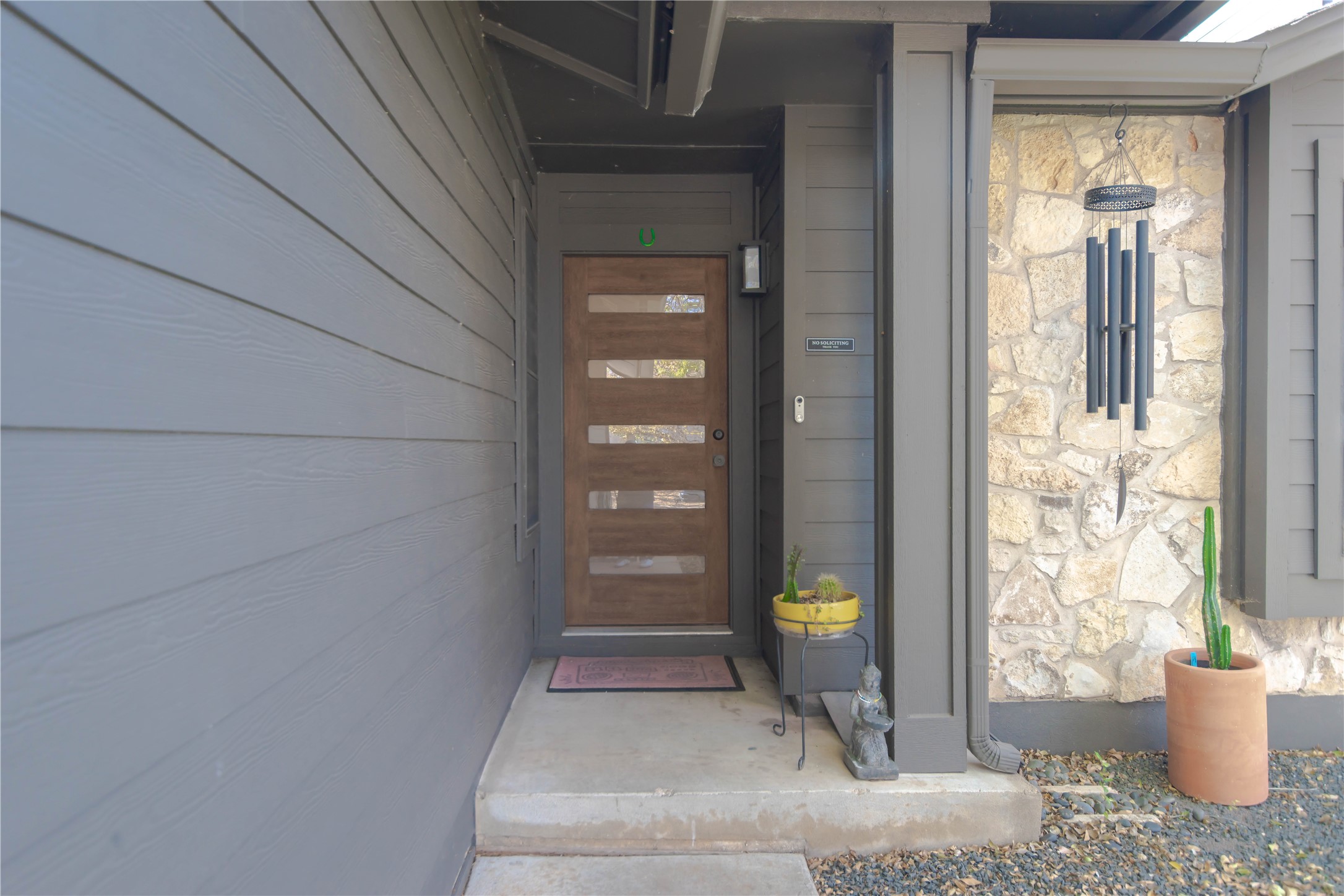 1622 Cattle Trail Austin, TX 78748 - Photo 3 of 22 a room that has a window and flowers in it