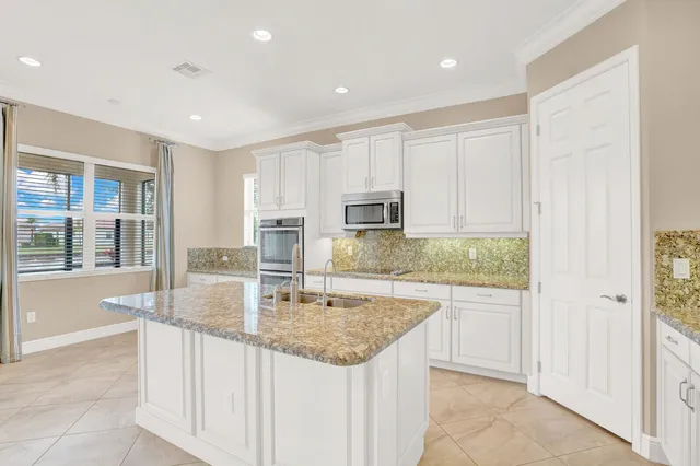 $695,000 | 2499 Vicara Court, Royal Palm Beach, FL 33411