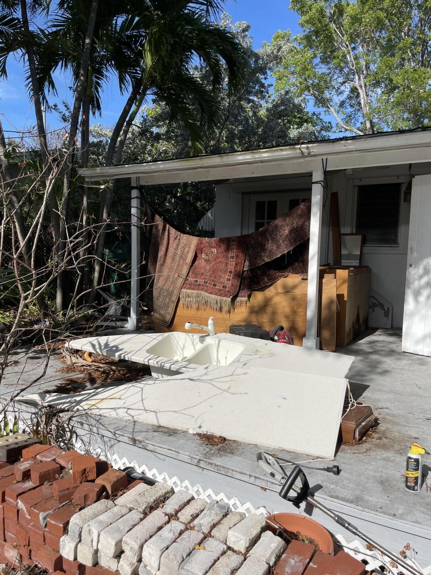 1716 Laird Street Key West, FL 33040 - Photo 2 of 32 a view of a backyard