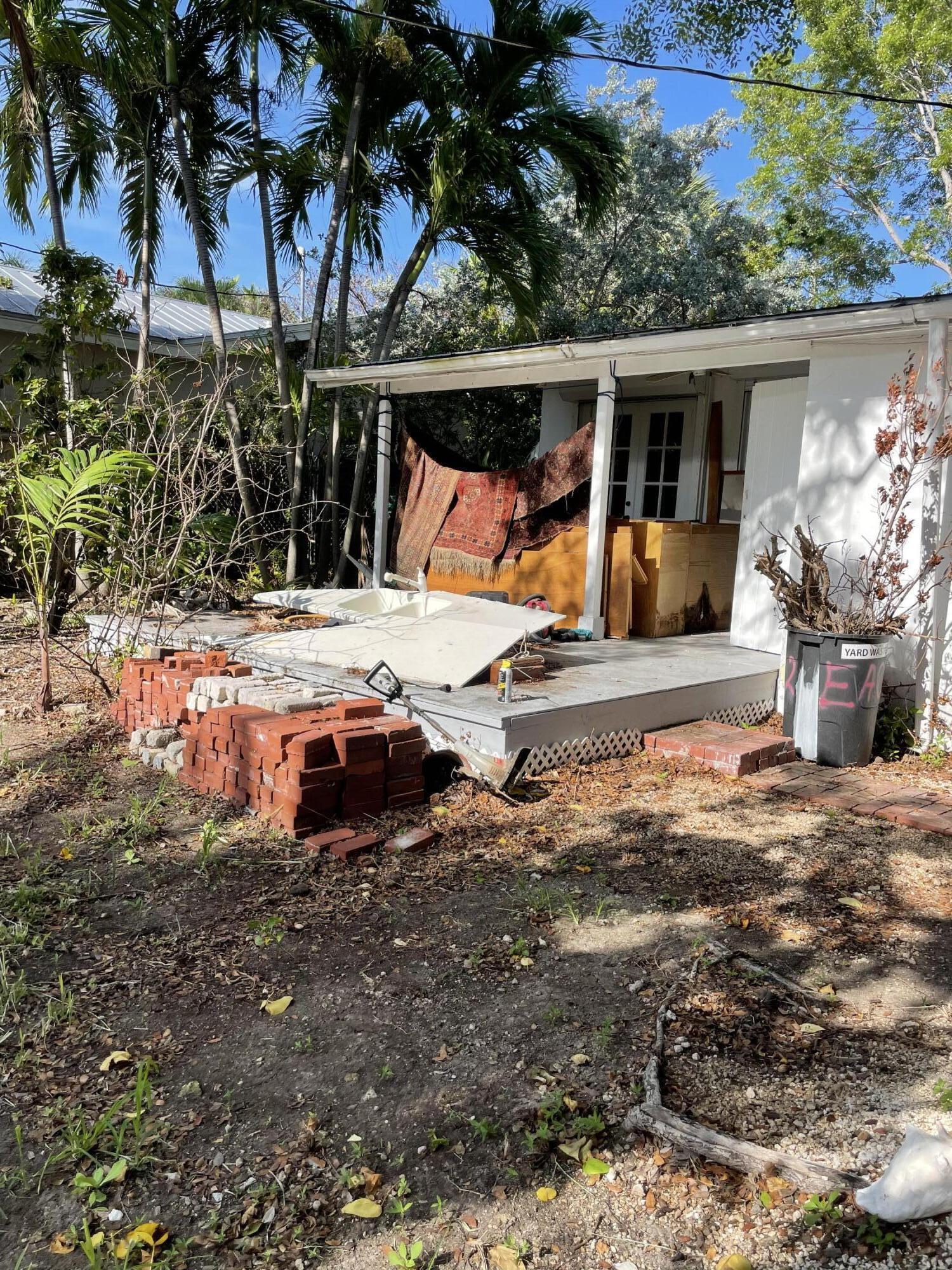 1716 Laird Street Key West, FL 33040 - Photo 6 of 32 a view of a outdoor space with porch and furniture
