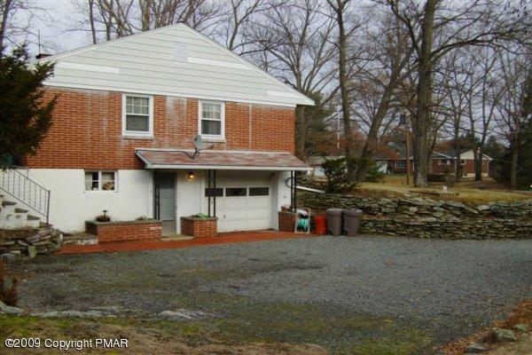 430 Quentin Road Stroudsburg, PA 18360 - Photo 9 of 11 Side with Garage