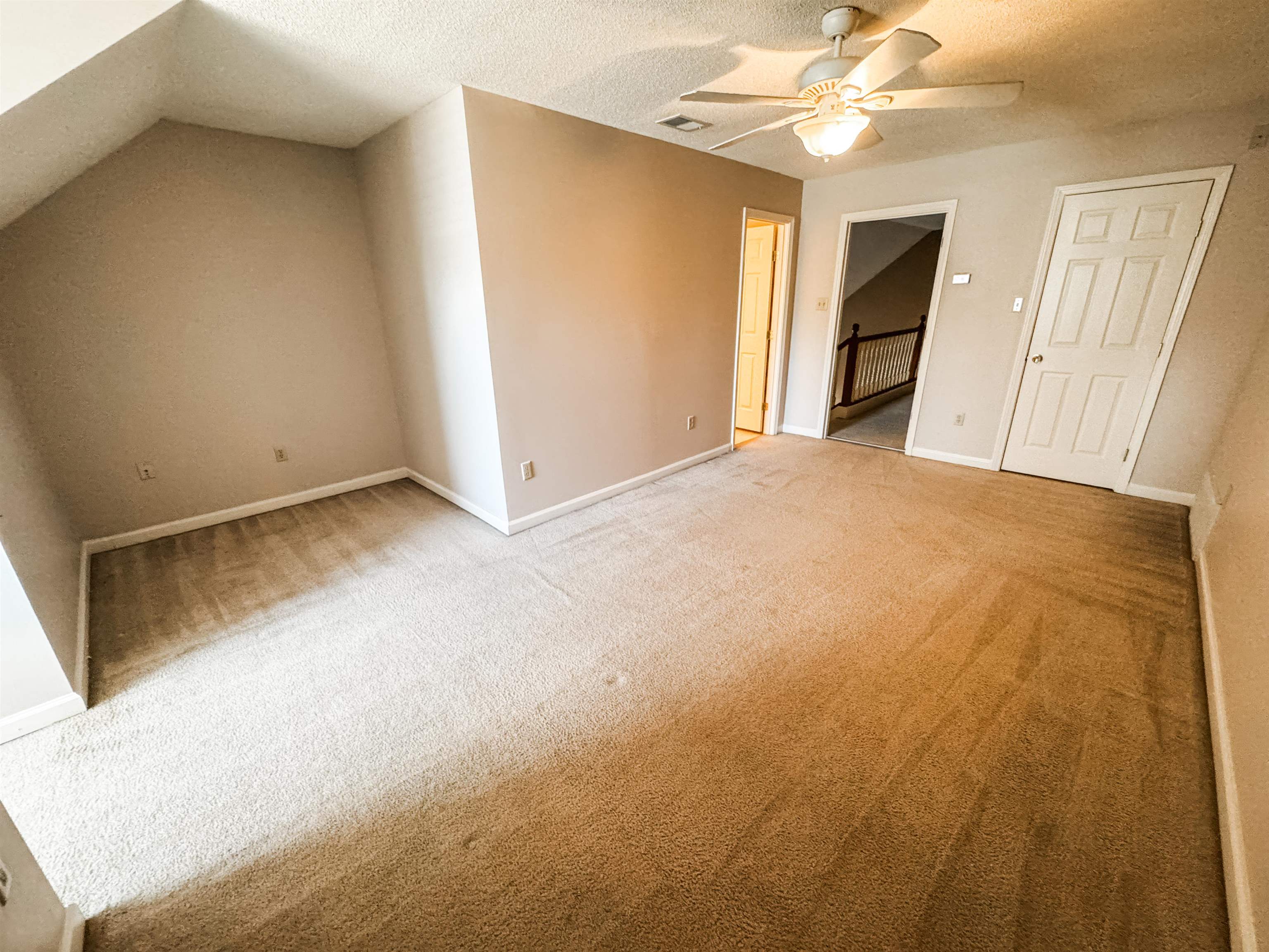 158 Eulas Ridge Cove Collierville, TN 38017 - Photo 15 of 18 Bonus room with visible vents, baseboards, carpet flooring, a textured ceiling, and a ceiling fan