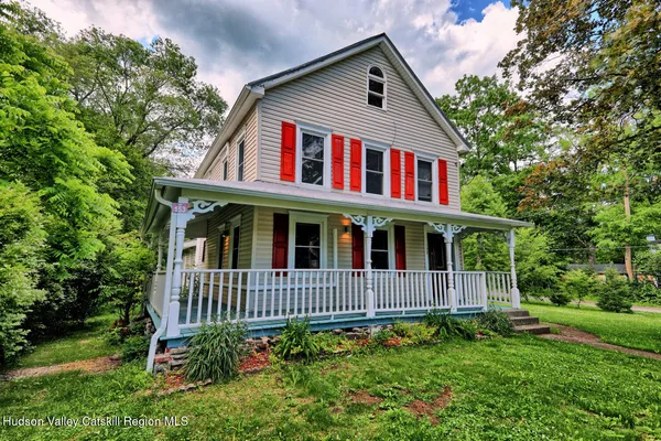 front view of a house with a yard
