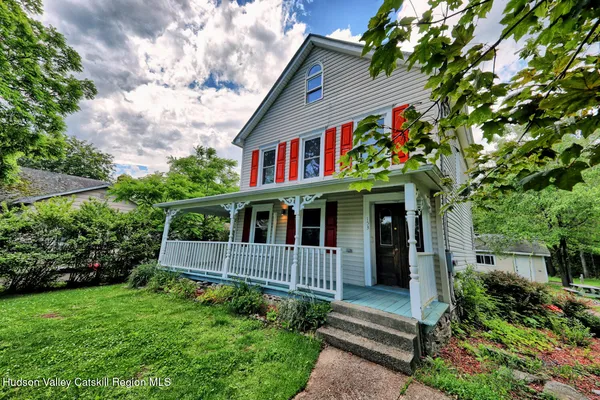 a front view of a house with porch