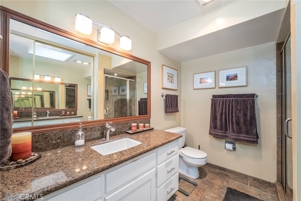 2100 2nd Street, Unit 505 Long Beach, CA 90803 - Photo 21 of 34 Remodeled Primary Bathroom with Skylight