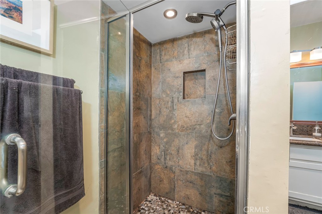 2100 2nd Street, Unit 505 Long Beach, CA 90803 - Photo 22 of 34 Remodeled Primary Shower with Stone Flooring