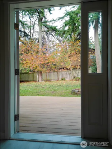 a view of porch with a yard