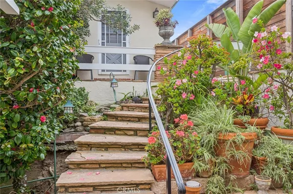 a view of entryway with flower around