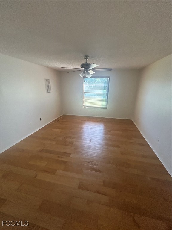 16268 Shadow Pine Road North Fort Myers, FL 33917 - Photo 11 of 25 an empty room with a empty space and a window