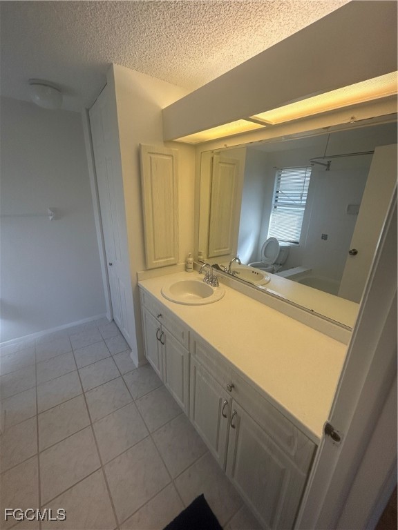 16268 Shadow Pine Road North Fort Myers, FL 33917 - Photo 12 of 25 a bathroom with a double vanity sink and mirror