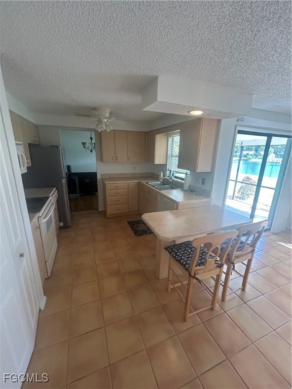 16268 Shadow Pine Road North Fort Myers, FL 33917 - Photo 8 of 25 a living room with furniture a flat screen tv and a window