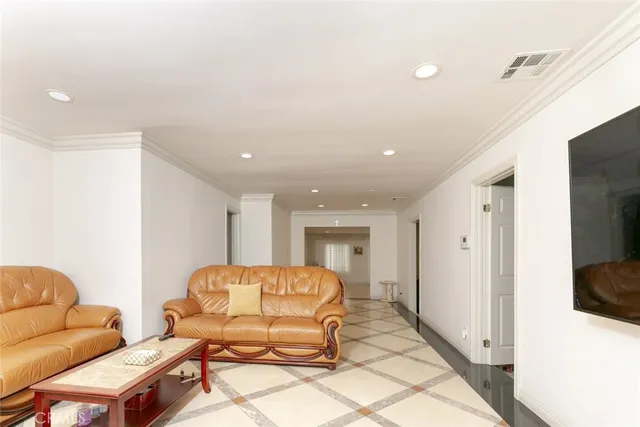 a living room with furniture and a couch