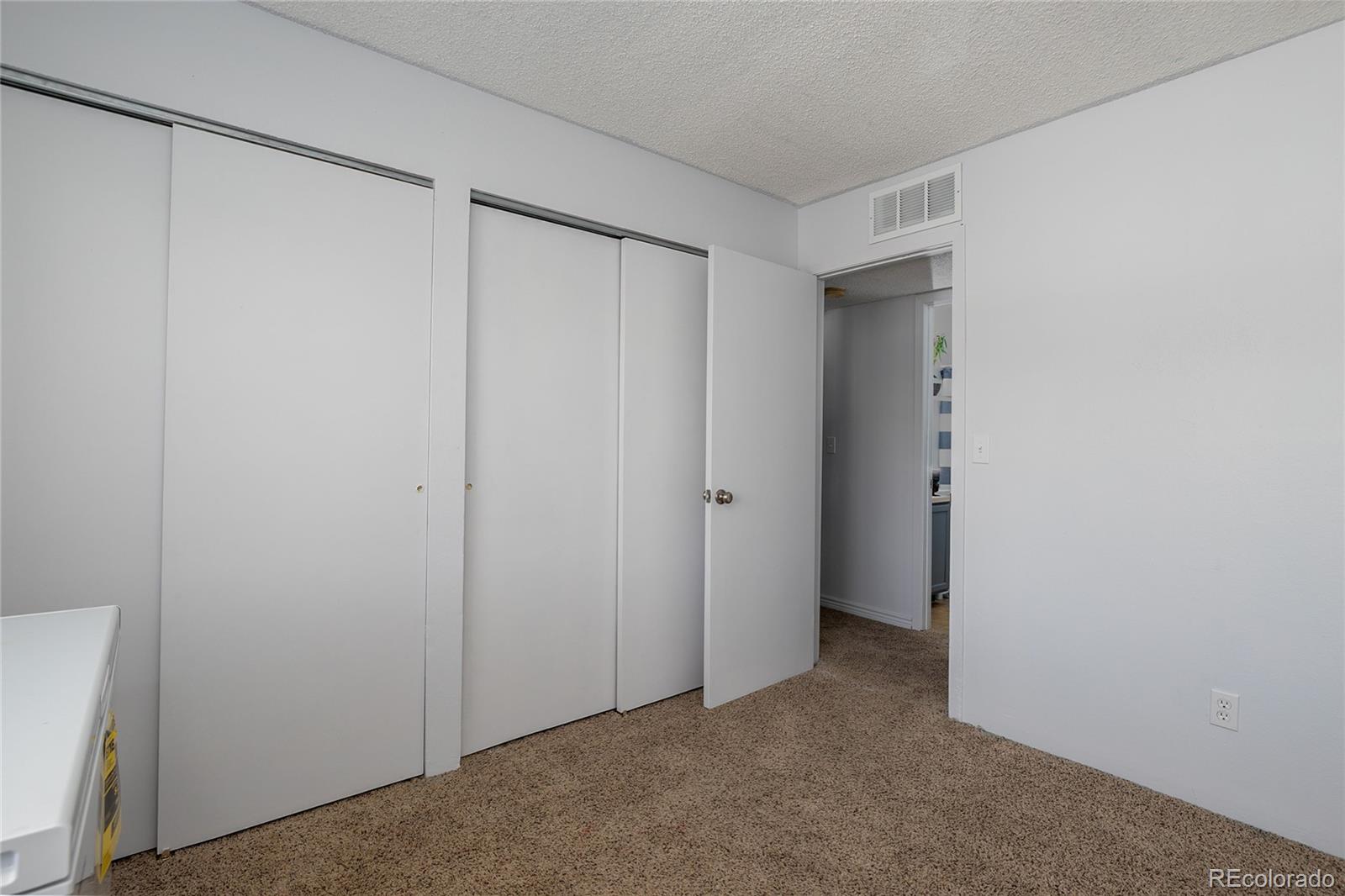 8741 Dawson Street, Unit 304 Denver, CO 80229 - Photo 23 of 27 a view of an empty room