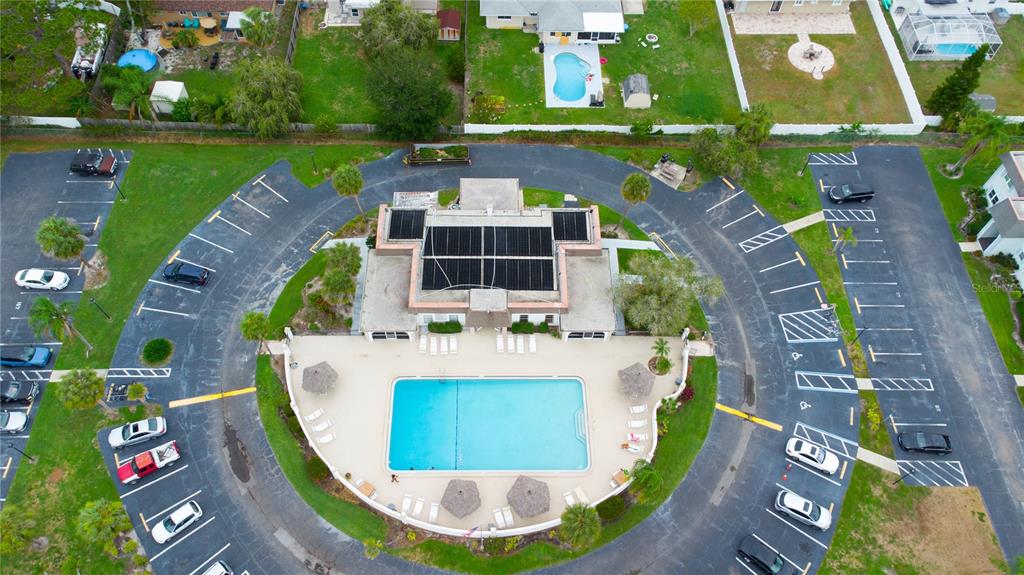 389 South McMullen Booth Road, Unit 12 Clearwater, FL 33759 - Photo 23 of 25 an aerial view of a house with outdoor space pool seating area and yard