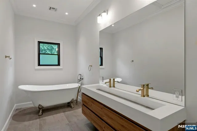 a bathroom with a sink and a bathtub