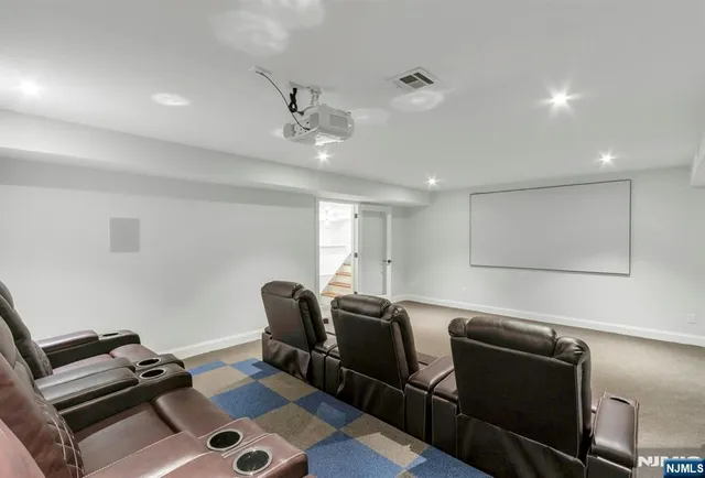 wooden floor in an empty room with a bathroom