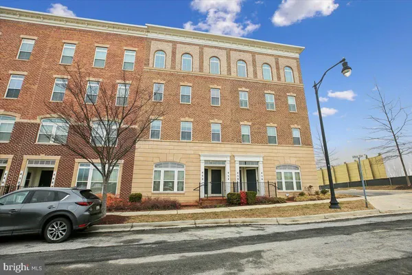 a front view of a building with multiple windows