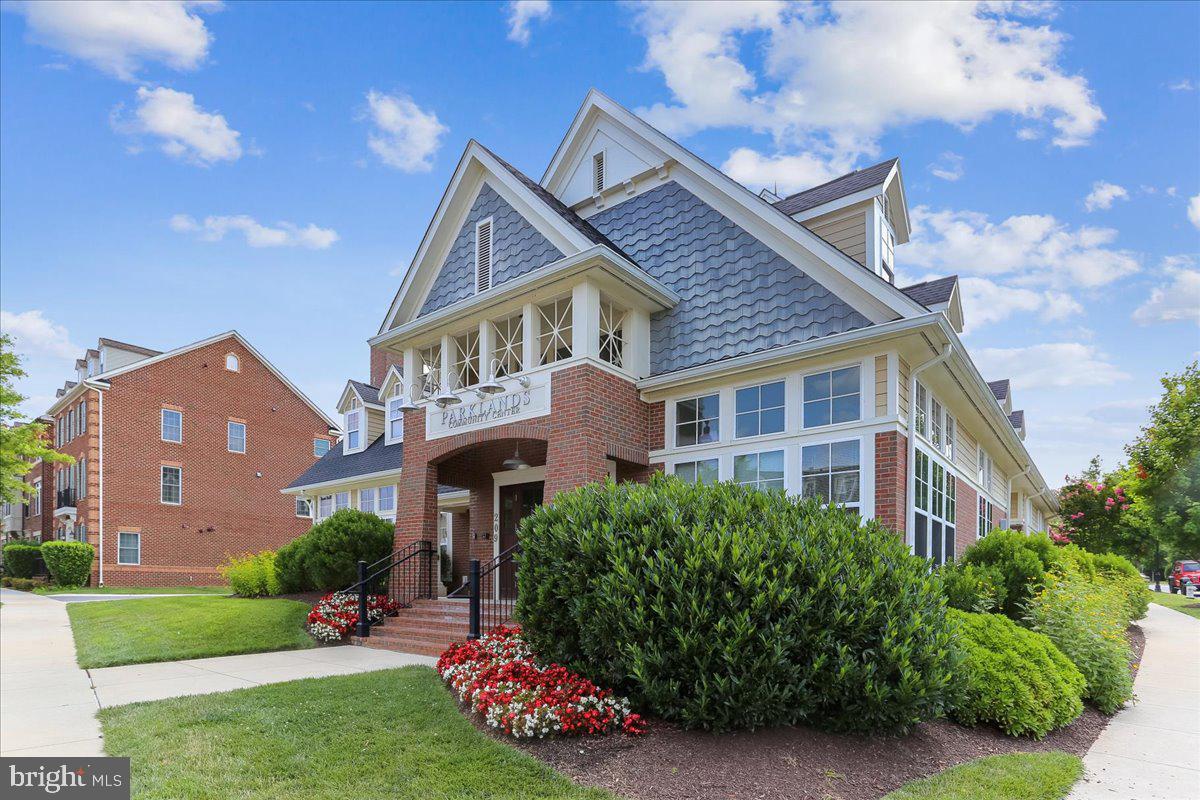 452 Exchange Avenue Gaithersburg, MD 20878 - Photo 20 of 37 a front view of a house with a garden