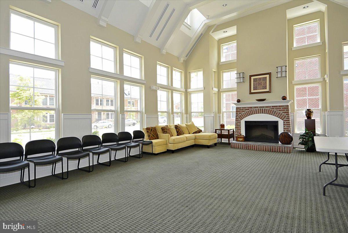 452 Exchange Avenue Gaithersburg, MD 20878 - Photo 25 of 37 a living room with furniture and a fireplace