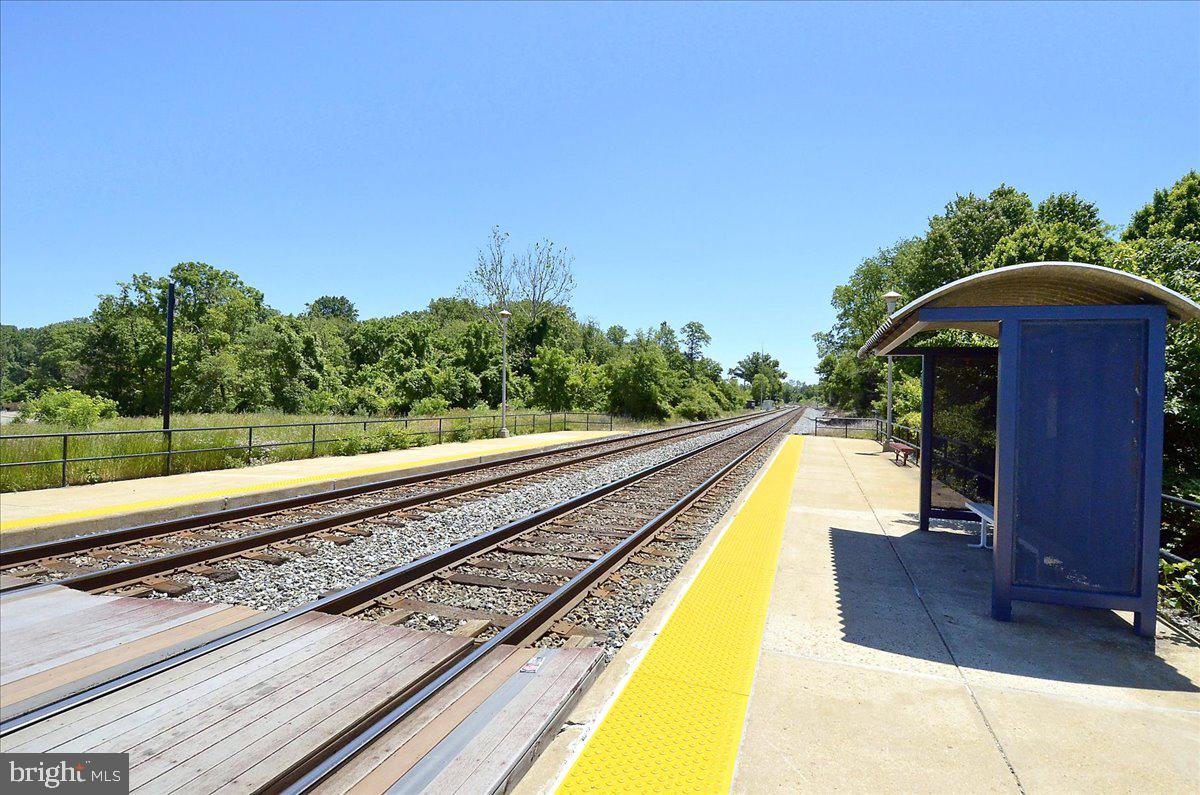 452 Exchange Avenue Gaithersburg, MD 20878 - Photo 32 of 37 a view of a swimming pool with a patio