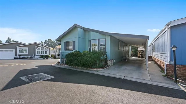 a view of a house with a street