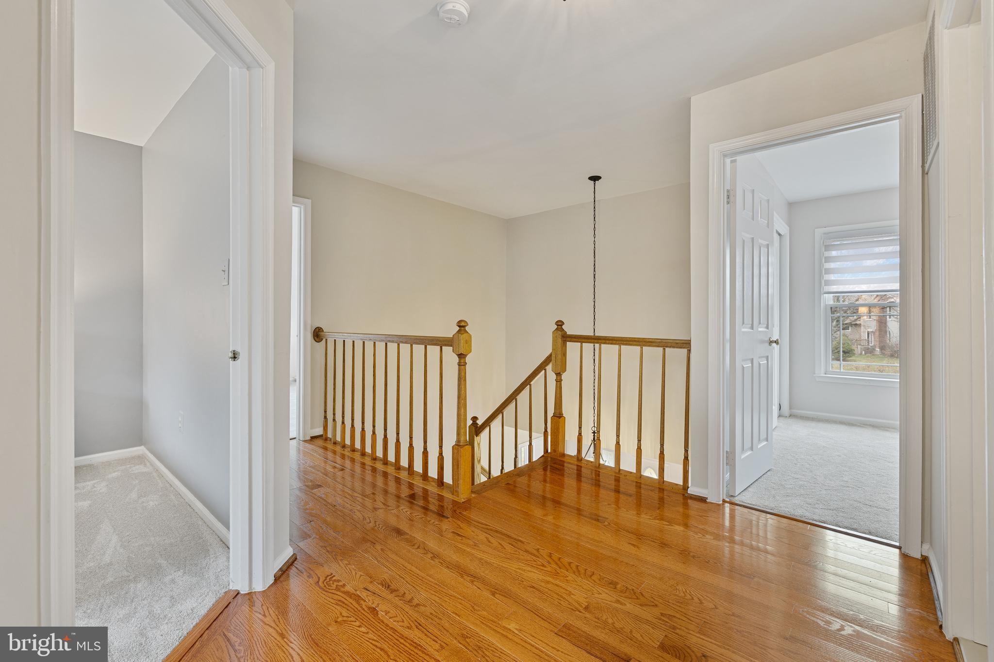 1439 Millikens Bend Road Herndon, VA 20170 - Photo 16 of 46 a view of hallway with wooden floor