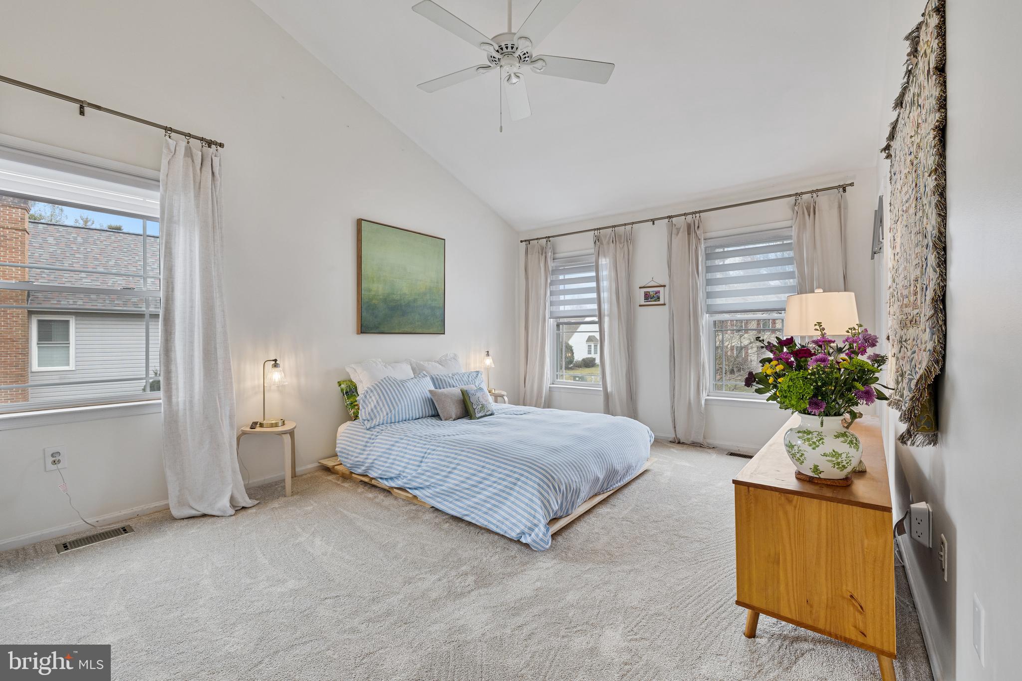 1439 Millikens Bend Road Herndon, VA 20170 - Photo 18 of 46 a bedroom with a bed potted plant and a window