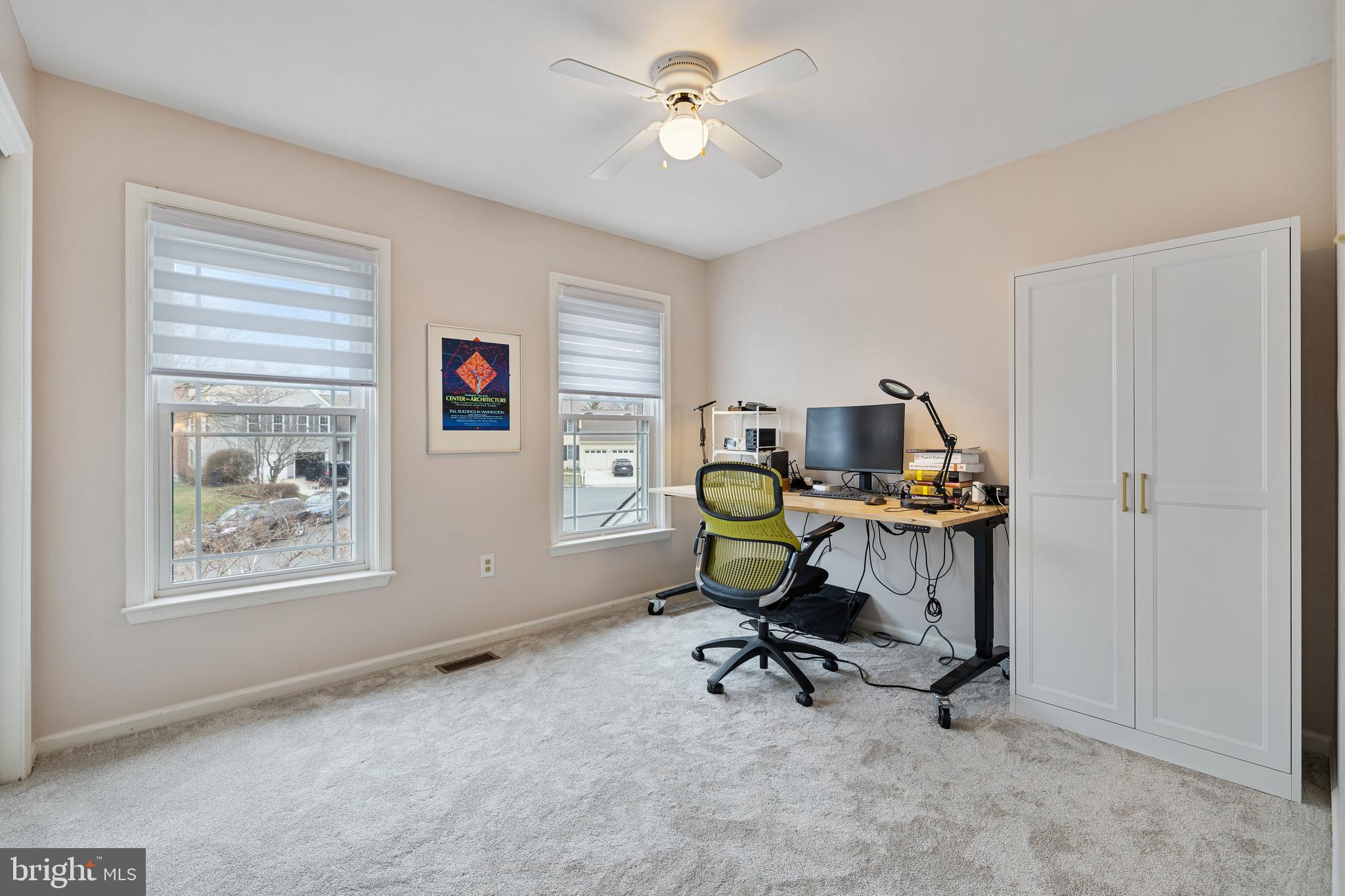 1439 Millikens Bend Road Herndon, VA 20170 - Photo 24 of 46 a view of a workspace with furniture and a window