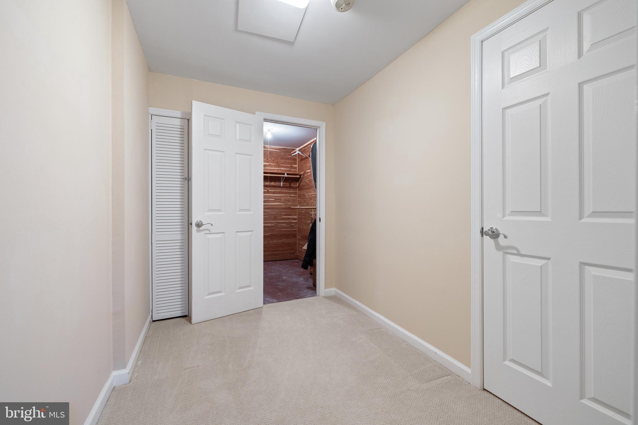 1439 Millikens Bend Road Herndon, VA 20170 - Photo 28 of 46 an empty room with closet area