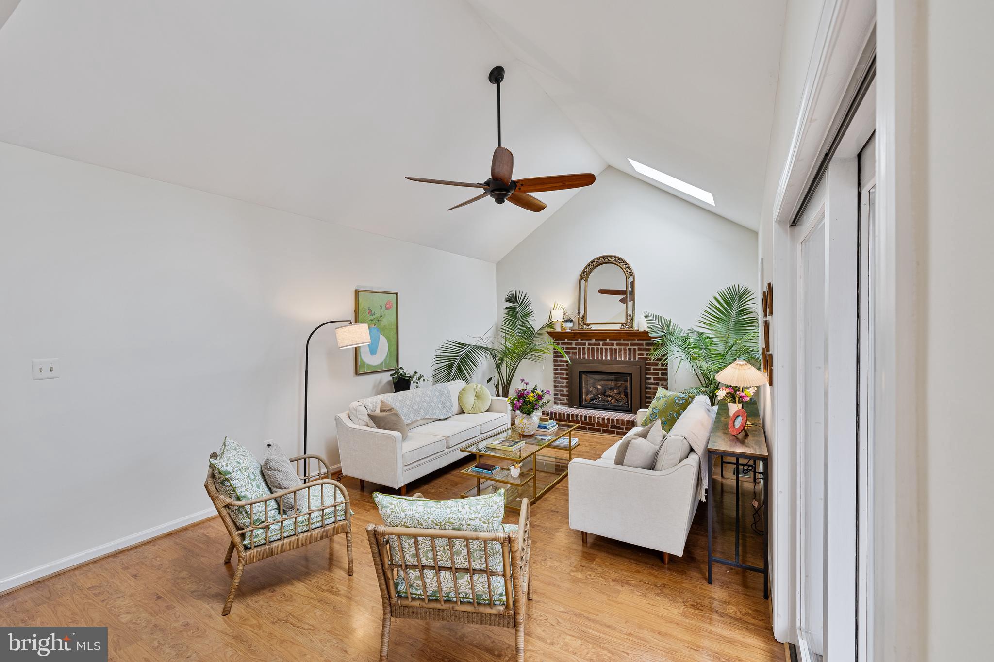 1439 Millikens Bend Road Herndon, VA 20170 - Photo 39 of 46 a living room with furniture a rug and a window