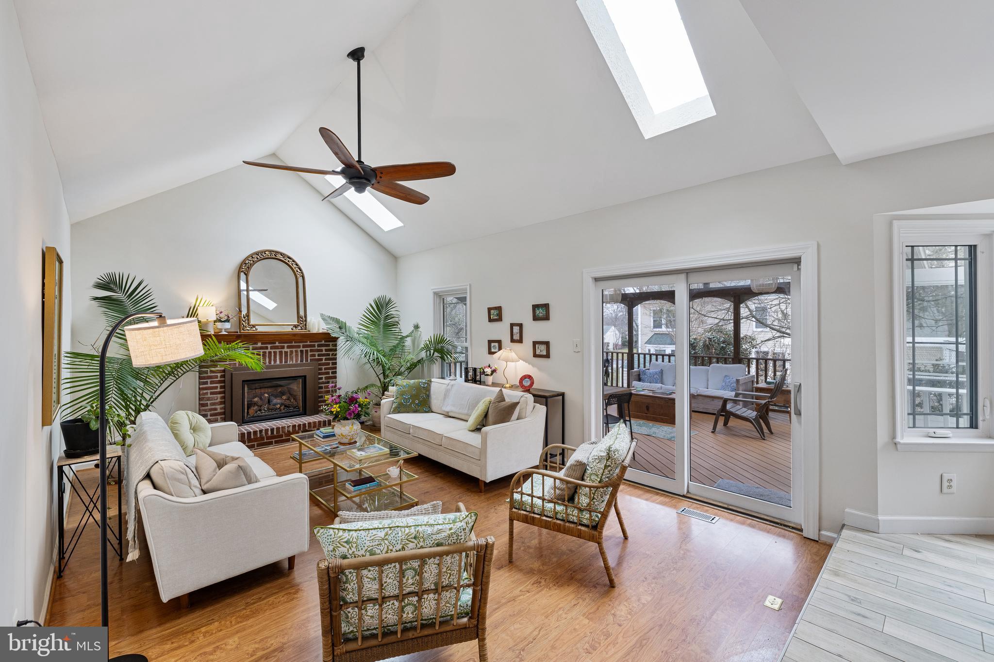 1439 Millikens Bend Road Herndon, VA 20170 - Photo 7 of 46 a living room with fireplace furniture and a window
