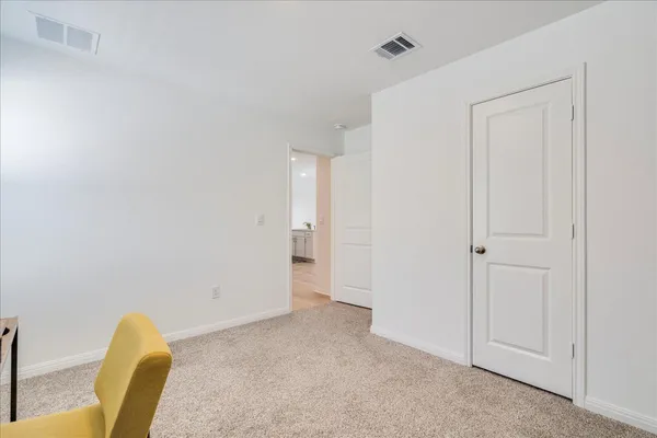 a view of a livingroom with wooden floor