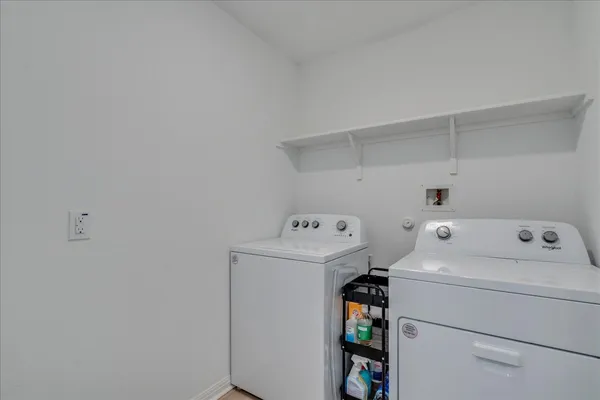 a utility room with dryer and washer