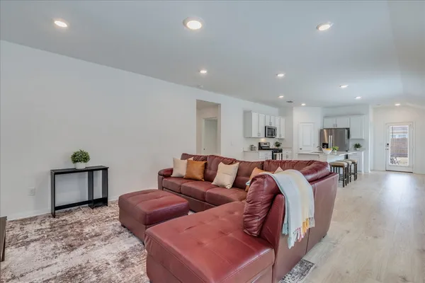 a living room with furniture and a couch