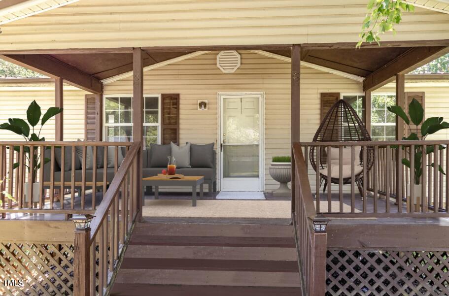 548 Riddle Avenue Hillsborough, NC 27278 - Photo 7 of 12 a view of staircase with white walls and windows
