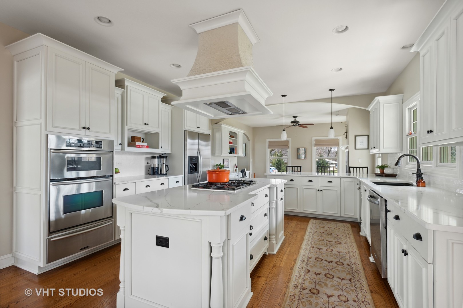 1044 Golf Lane Wheaton, IL 60189 - Photo 13 of 43 a kitchen with counter top space cabinets and stainless steel appliances