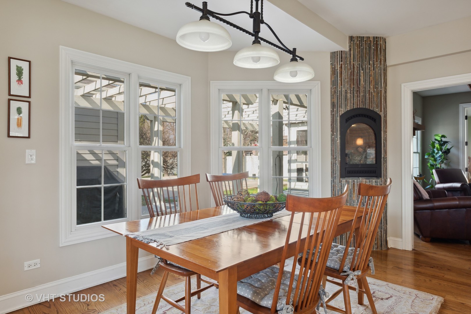 1044 Golf Lane Wheaton, IL 60189 - Photo 20 of 43 a view of a dining room with furniture window and wooden floor