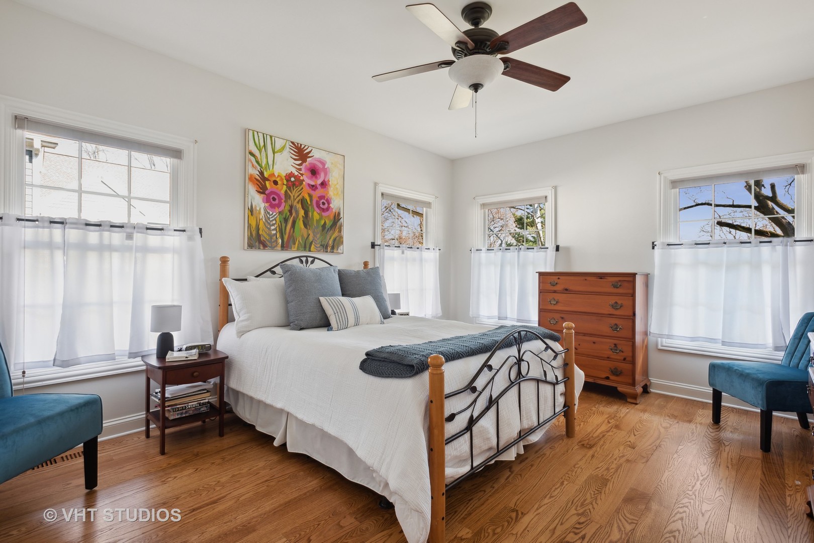 1044 Golf Lane Wheaton, IL 60189 - Photo 24 of 43 a bedroom with a bed a dresser next to a window