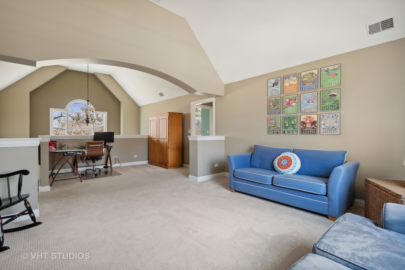1044 Golf Lane Wheaton, IL 60189 - Photo 27 of 43 a living room with furniture and a painting on the wall
