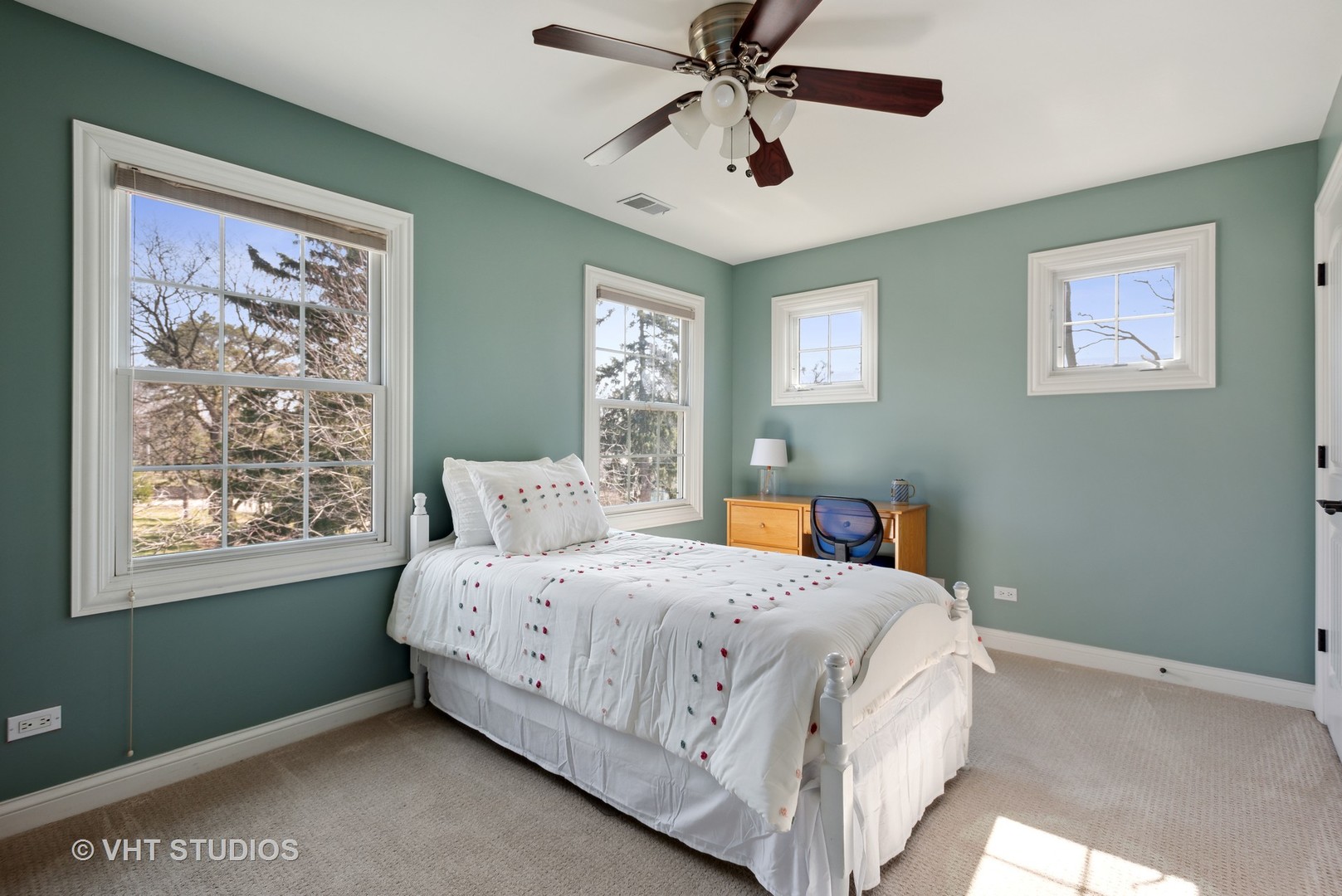 1044 Golf Lane Wheaton, IL 60189 - Photo 32 of 43 a bedroom with a large bed and a window