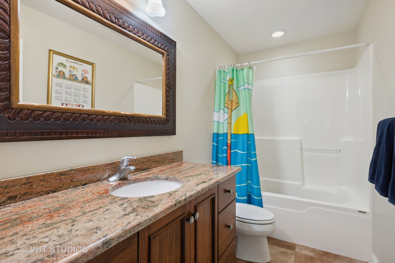1044 Golf Lane Wheaton, IL 60189 - Photo 33 of 43 a bathroom with a granite countertop sink a toilet a mirror and bathtub