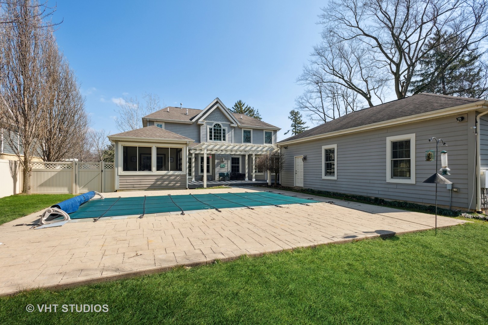 1044 Golf Lane Wheaton, IL 60189 - Photo 39 of 43 a front view of a house with a garden