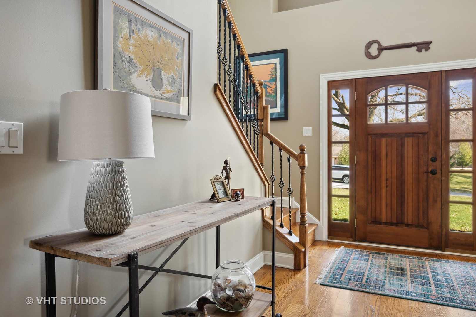 1044 Golf Lane Wheaton, IL 60189 - Photo 4 of 43 a view of hall way with furniture and stairs