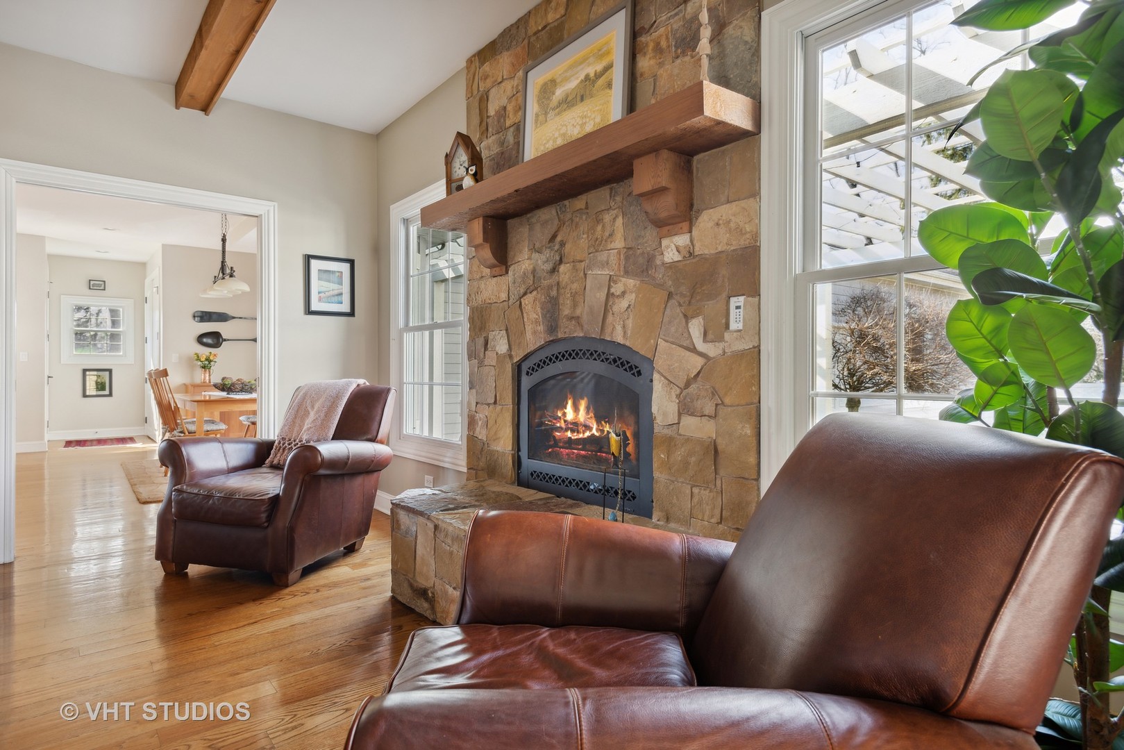 1044 Golf Lane Wheaton, IL 60189 - Photo 8 of 43 a living room with furniture and a fireplace