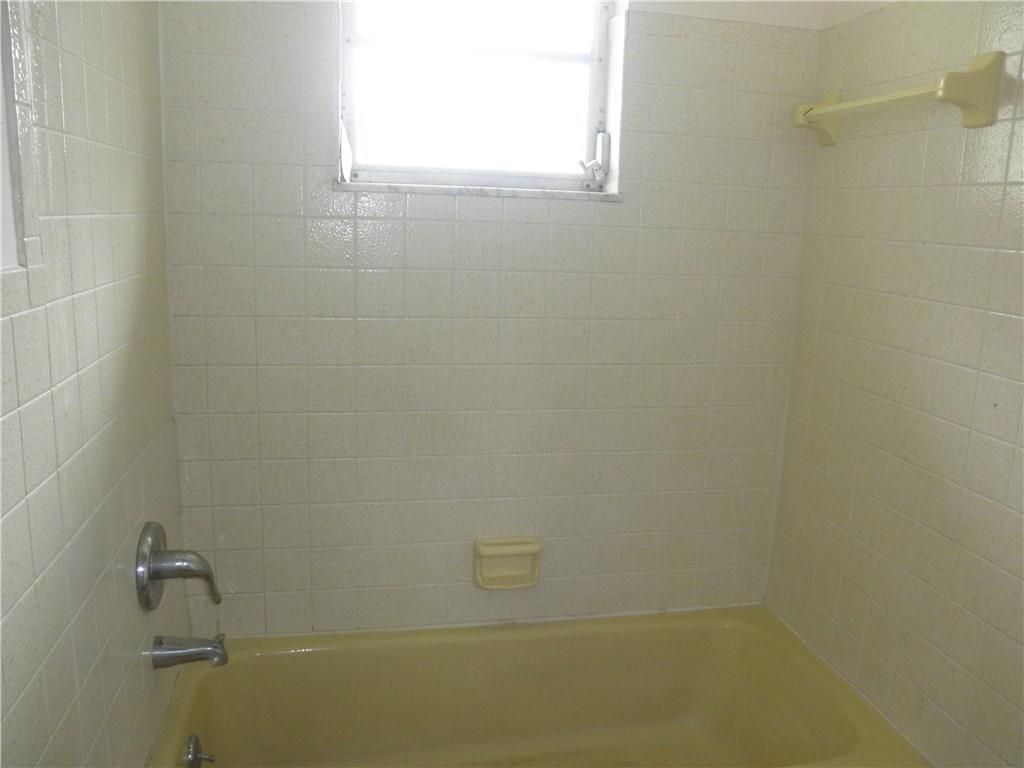 540 South Manor Drive Stuart, FL 34994 - Photo 16 of 22 a bathroom with a window