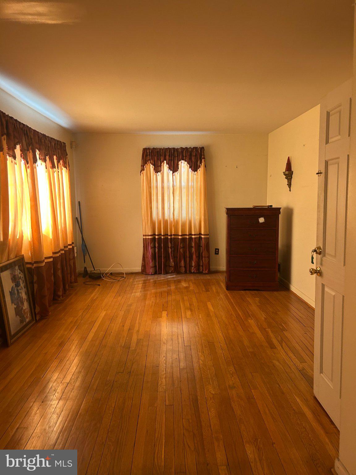 9904 Lanham Severn Road Lanham, MD 20706 - Photo 5 of 14 Sunlit space with warm wooden floors.