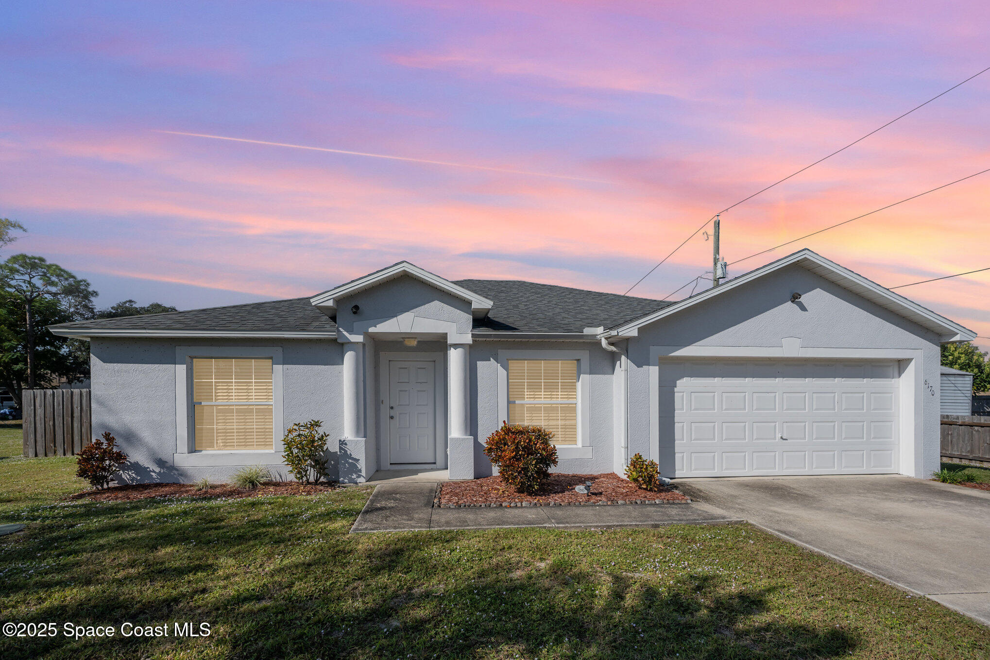 6170 Clearfield Avenue Cocoa, FL 32927 - Photo 1 of 24 a view of a house with backyard
