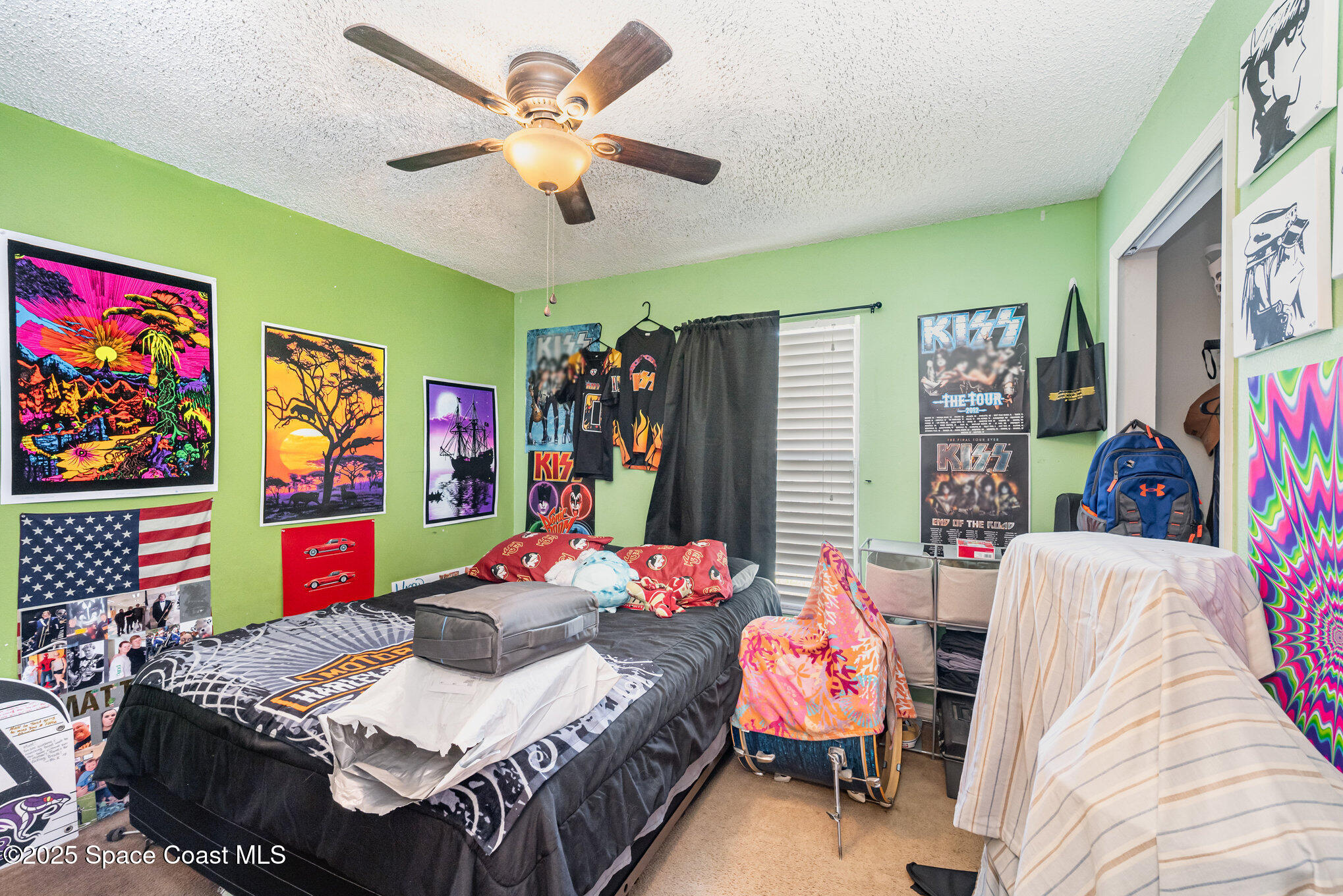 6170 Clearfield Avenue Cocoa, FL 32927 - Photo 18 of 24 a bedroom with furniture and a bed