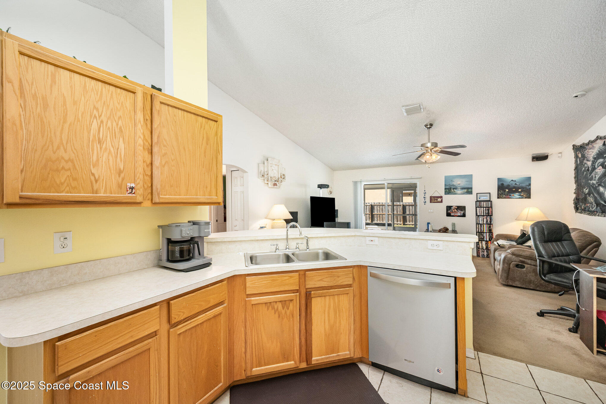 6170 Clearfield Avenue Cocoa, FL 32927 - Photo 6 of 24 a kitchen with sink and cabinets