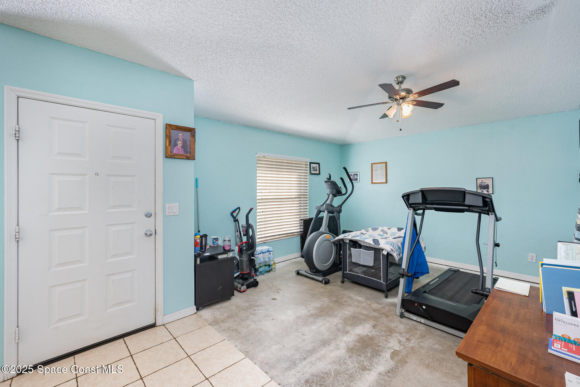 6170 Clearfield Avenue Cocoa, FL 32927 - Photo 8 of 24 a bedroom with furniture and a window